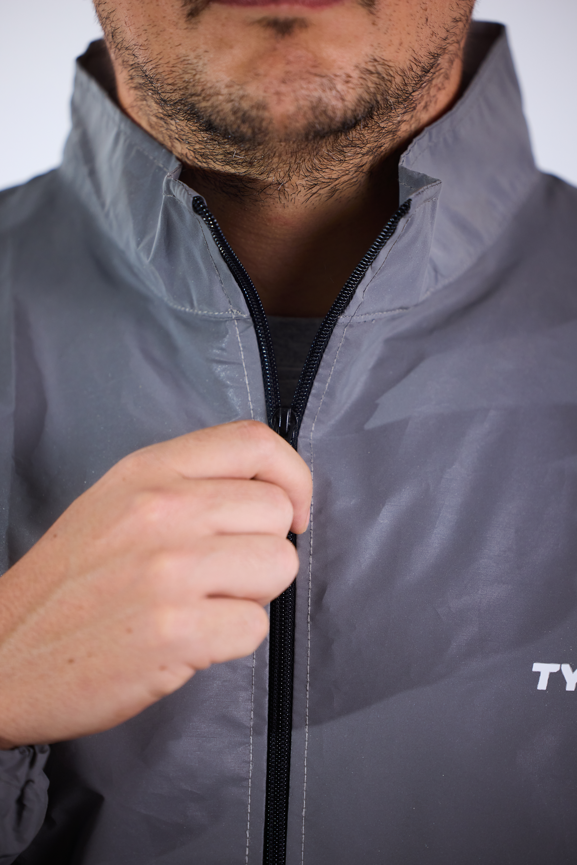 Chaqueta reflectiva cuello alto para motociclista